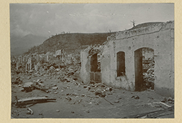 View of buildings and rubble in St. Pierre, Martinique, after eruption of Mt. Pelee