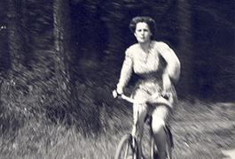 French woman bicycling through the invasion of Southern France, 1944