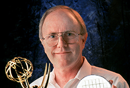 [Dr. Larry Hornbeck with TI's 1998 Emmy Award], ca. 1998