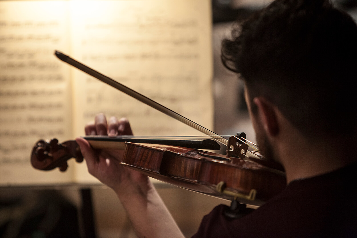 Student Playing Violin Cosi FanTutti Feb 2020