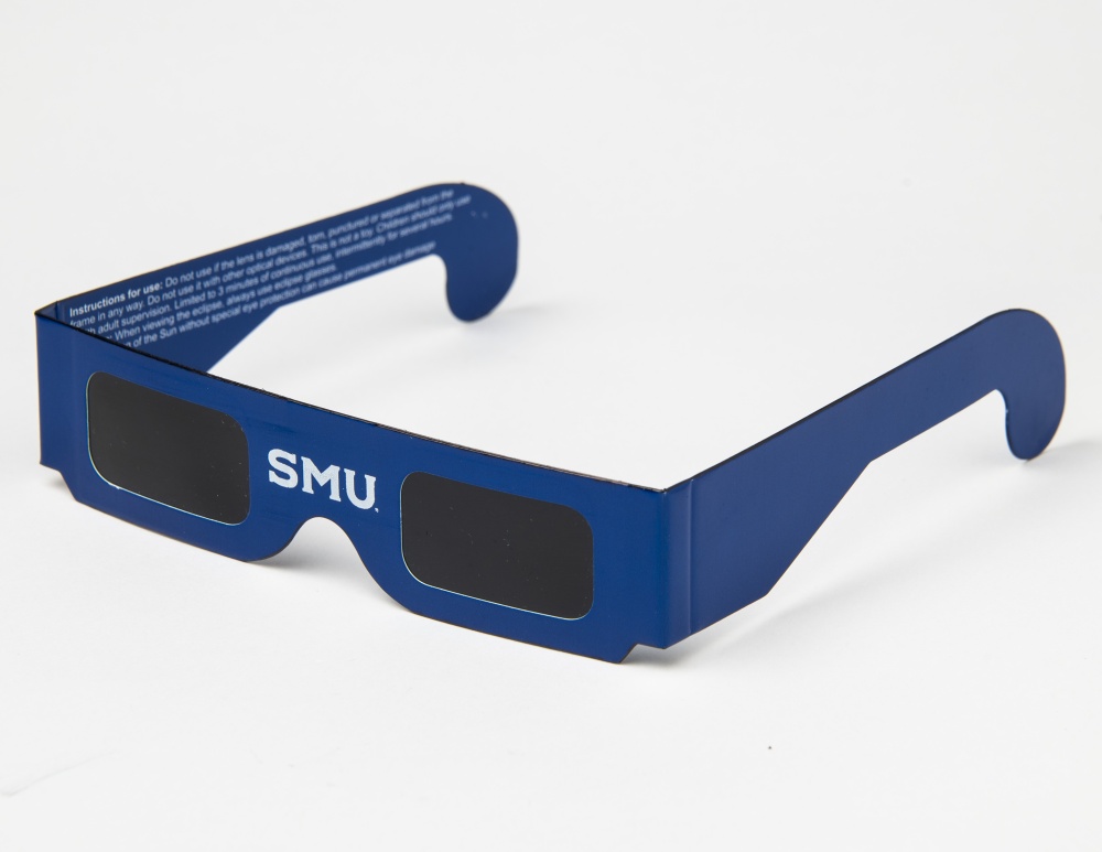 Solar eclipse viewing glasses with SMU branding