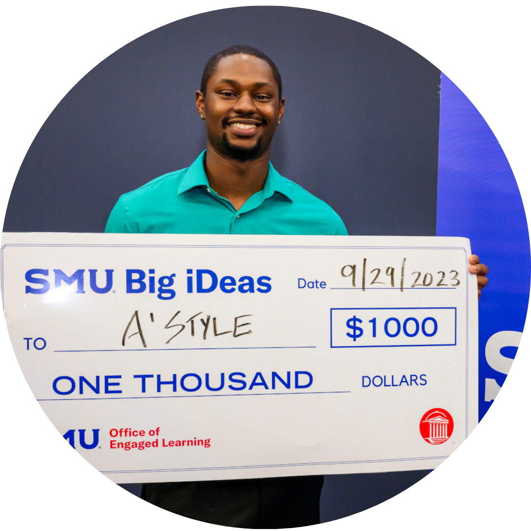 Atrion Sorrells, founder of A Style, with big check from Big iDeas