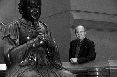 Dawson Orr with statue of Buddha