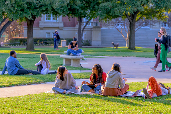 Students relaxing on the lawn