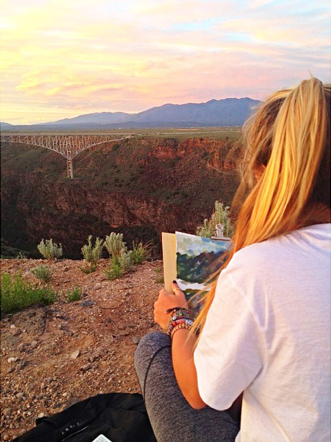 SMU-in-Taos student paints at the Rio Grande Gorge