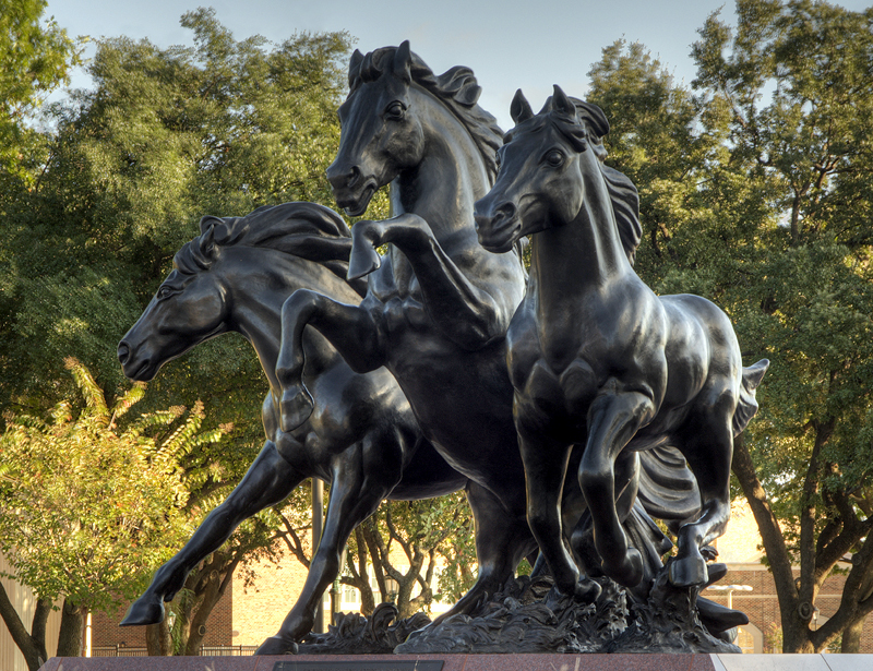 The Mustangs statue at Moody Coliseum