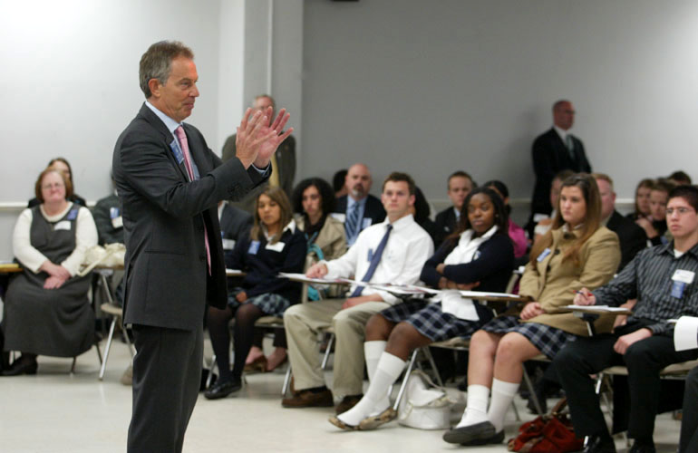 Former British Prime Minister Tony Blair speaks to an SMU class.