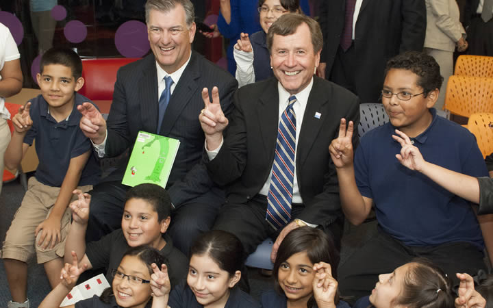 Dallas Mayor Mike Rawlings and SMU President R. Gerald Turner with students launching the Mayor's Summer Reading Club