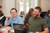Students eat, fellowship, and work on homework in the Refectory.