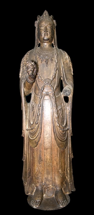 The exhibit includes this sixth century “Standing Avalokiteshvara” from the Buddhist cave temples of Xiangtangshan, China. The limestone sculpture with lacquerlike coating is on loan from the University of Pennsylvania Museum of Archaeology and Anthropology.