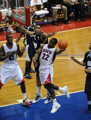 SMU's Papa Dia (42) and Mike Walker (22) in Wednesday's game against Oral Roberts University