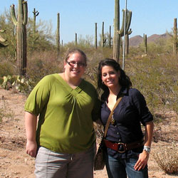 SMU Embrey Human Rights Program students Jordan Johansen, left, and Adriana Martinez stand at a water station for migrants in the Arizona desert during their Student Leadership Initiative trip in January 2011.