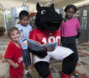 Peruna joins young readers at the Bachman Lake Branch Library.