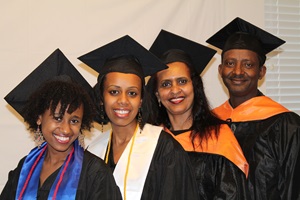 SMU grad Roza Essaw, far left, will earn academic degrees in May 2013 along with her sister, mother and father.