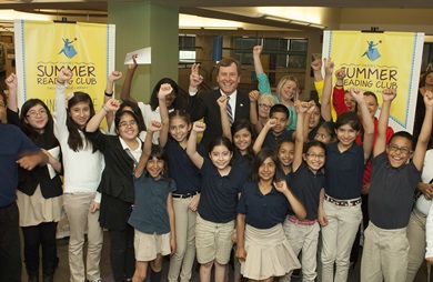 SMU President R. Gerald Turner with students at the announcement of the Dallas Mayor's Reading Club
