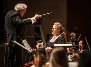 Paul Phillips conducting and guest artist mezzo soprano Michaela Martens singing at Meadows at the Meyerson on 31 March 2015
