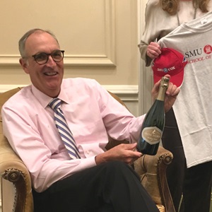 In honor of the Mustangs, Dean Myers sent Dean Erekson a bottle of Iron Horse sparkling wine, along with a logoed T-shirt and other red and blue SMU-specific apparel. 