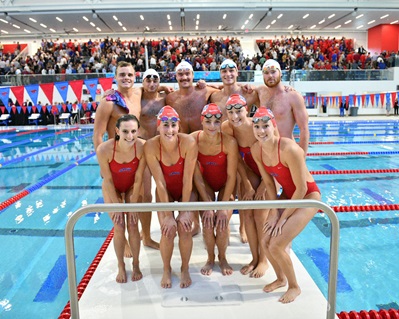 Swimmers at the dedication of the Robson & Lindley Aquatics Center