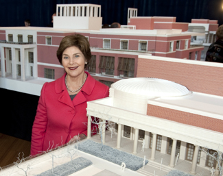 Laura Bush with model of the Bush Presidential Center