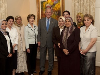 George and Laura Bush visit with Iraqi women at SMU