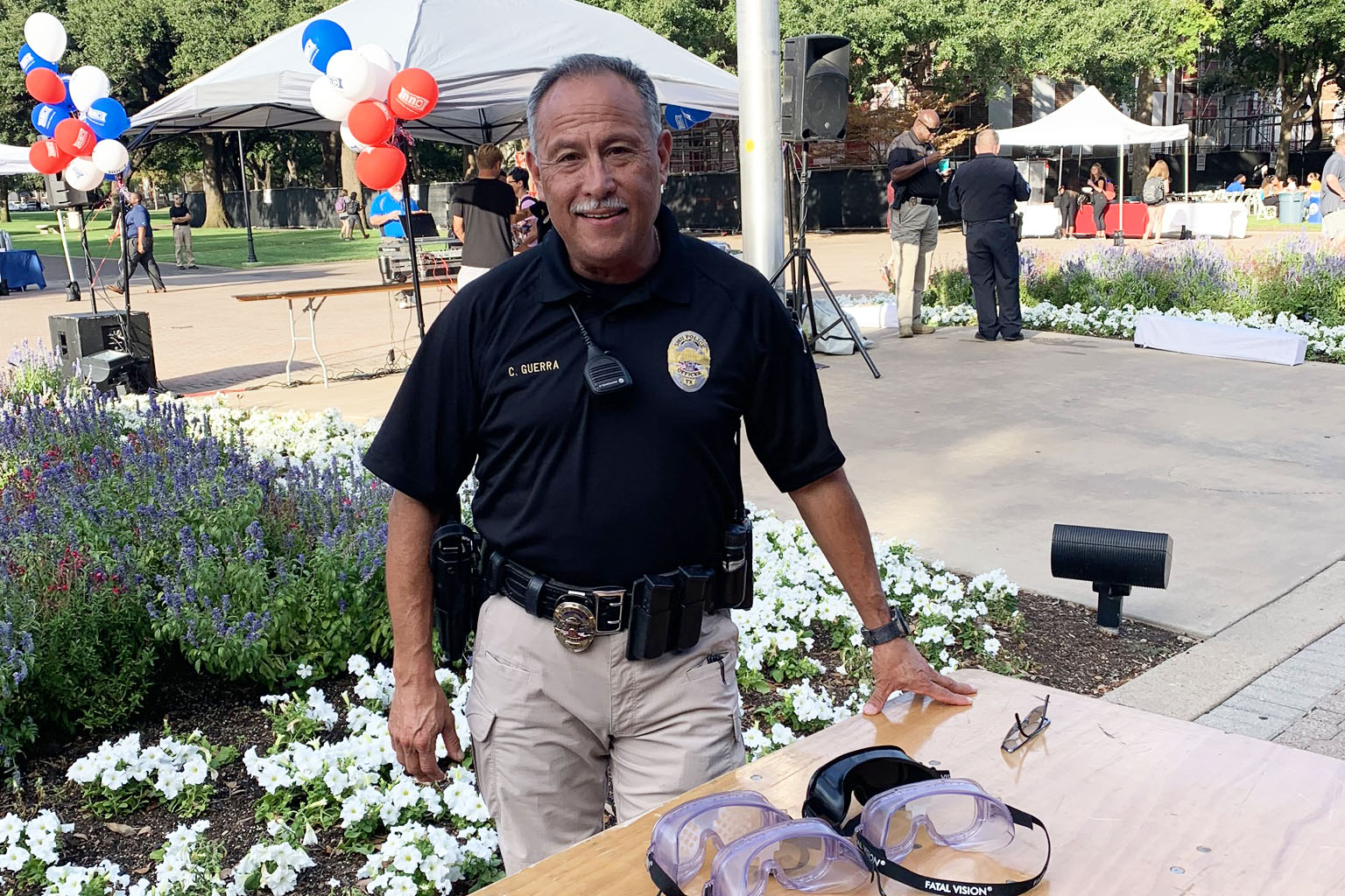 SMU police officer at community event on the main quad