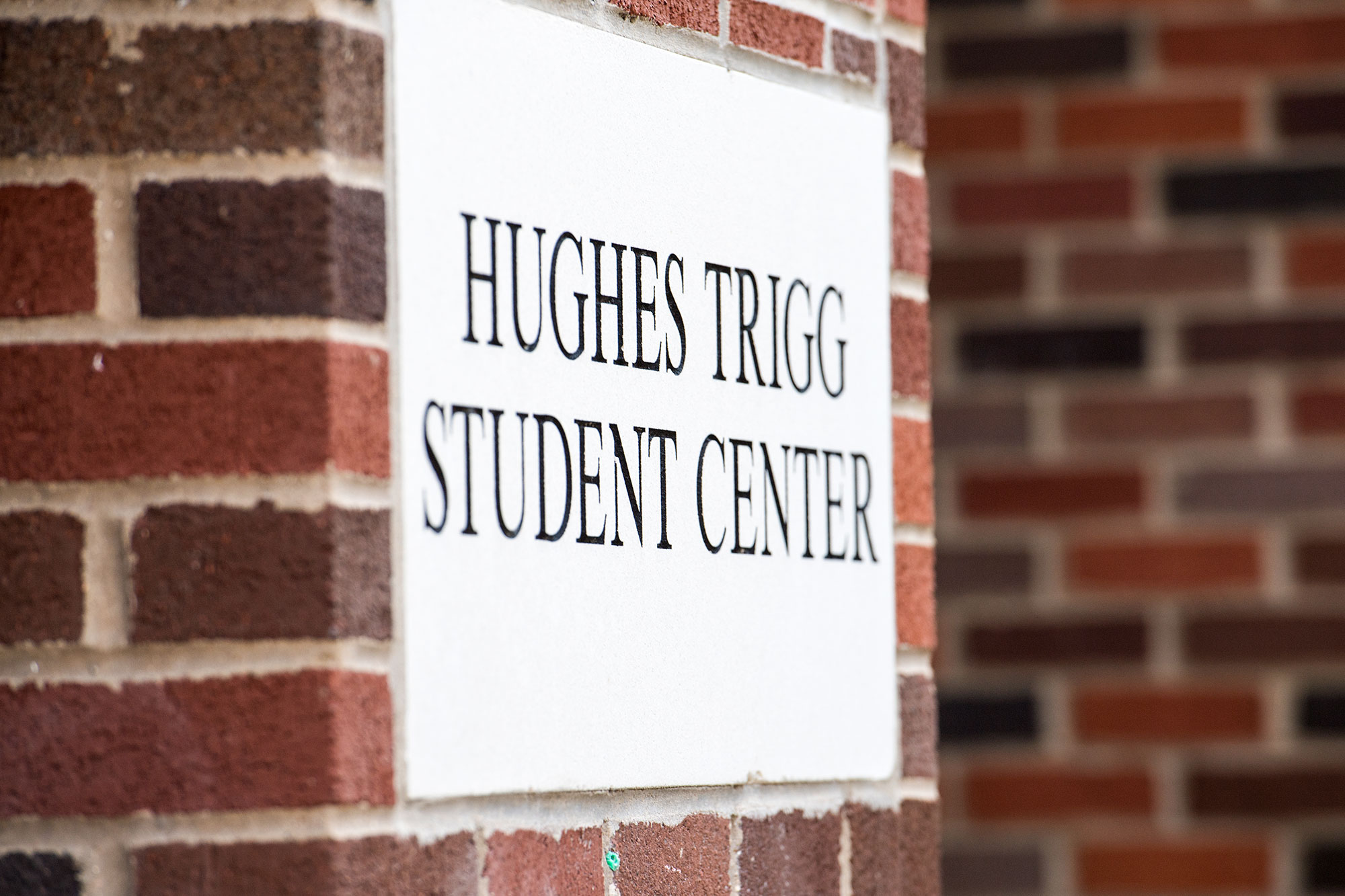 PHoto of building sign: Hughes-Trigg Student Center