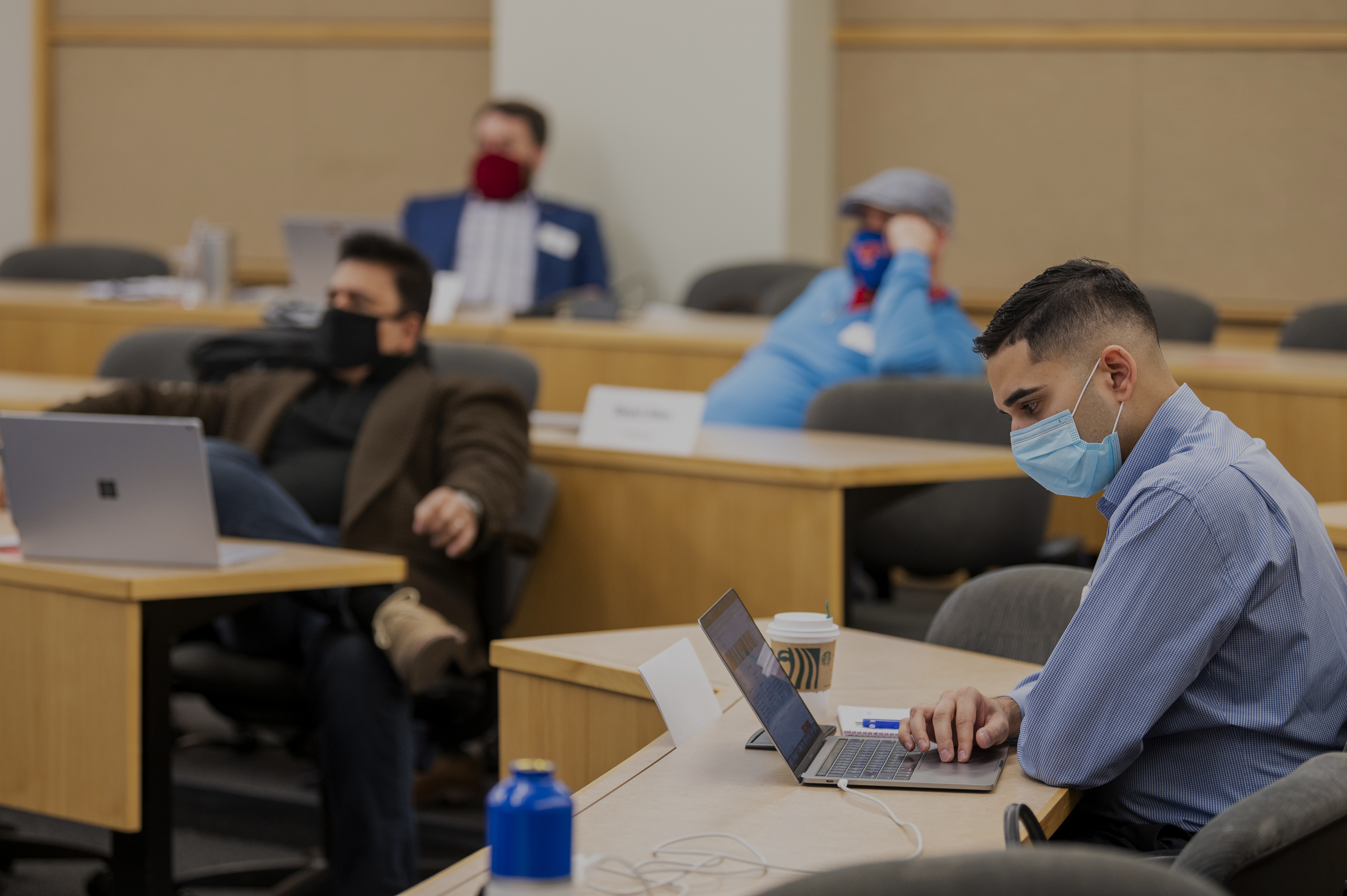 MBA masked students in class