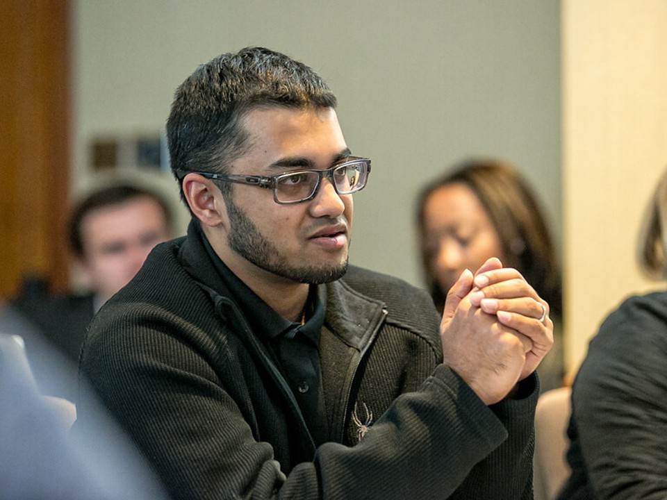 An SMU Cox Online MBA student listens to a lecture