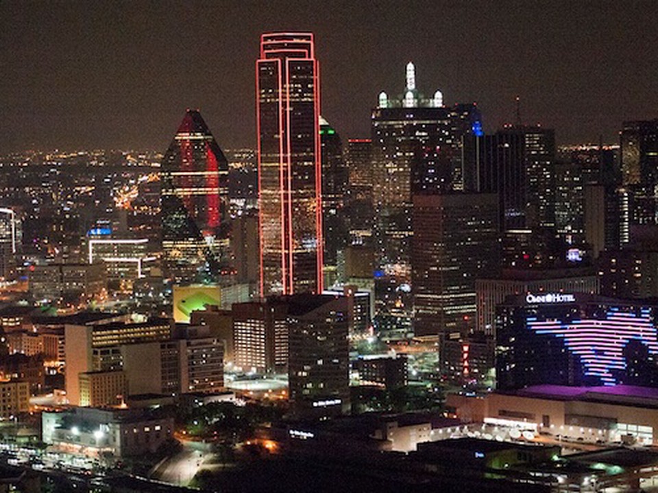 The skyline near the SMU Cox campus at night