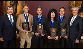 Four SMU professors received 2018 Ford Research Fellowships during the University’s Board of Trustees Meeting in May. Pictured left to right: SMU President R. Gerald Turner, Adam Herring, Klaus Desmet, Elfi Kraka, MinJun Kim, and SMU Provost and Vice President for Academic Affairs Steven C. Currall.  Photo credit: SMU | Allison Slomowitz