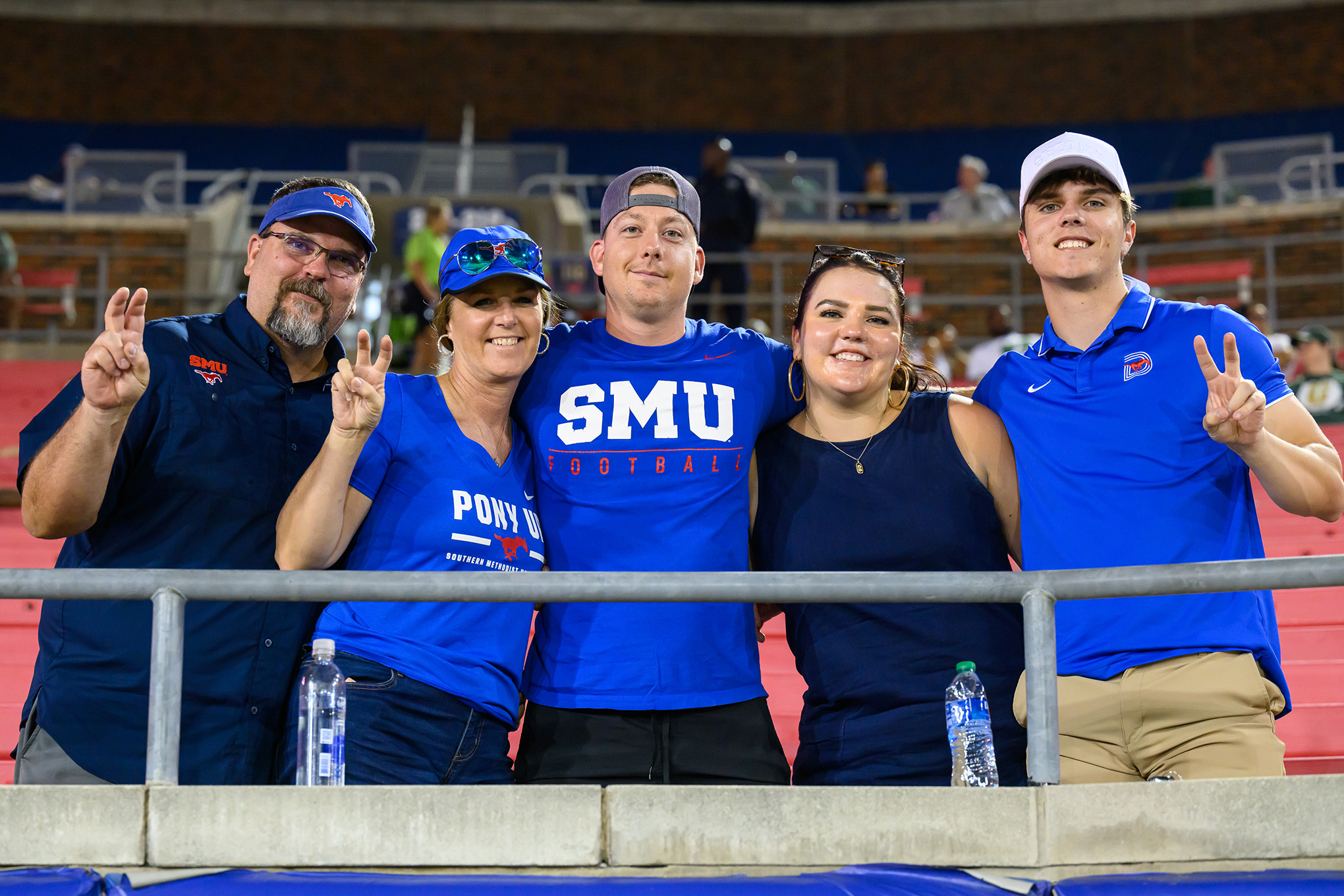  SMU students and family members in the stands during football game