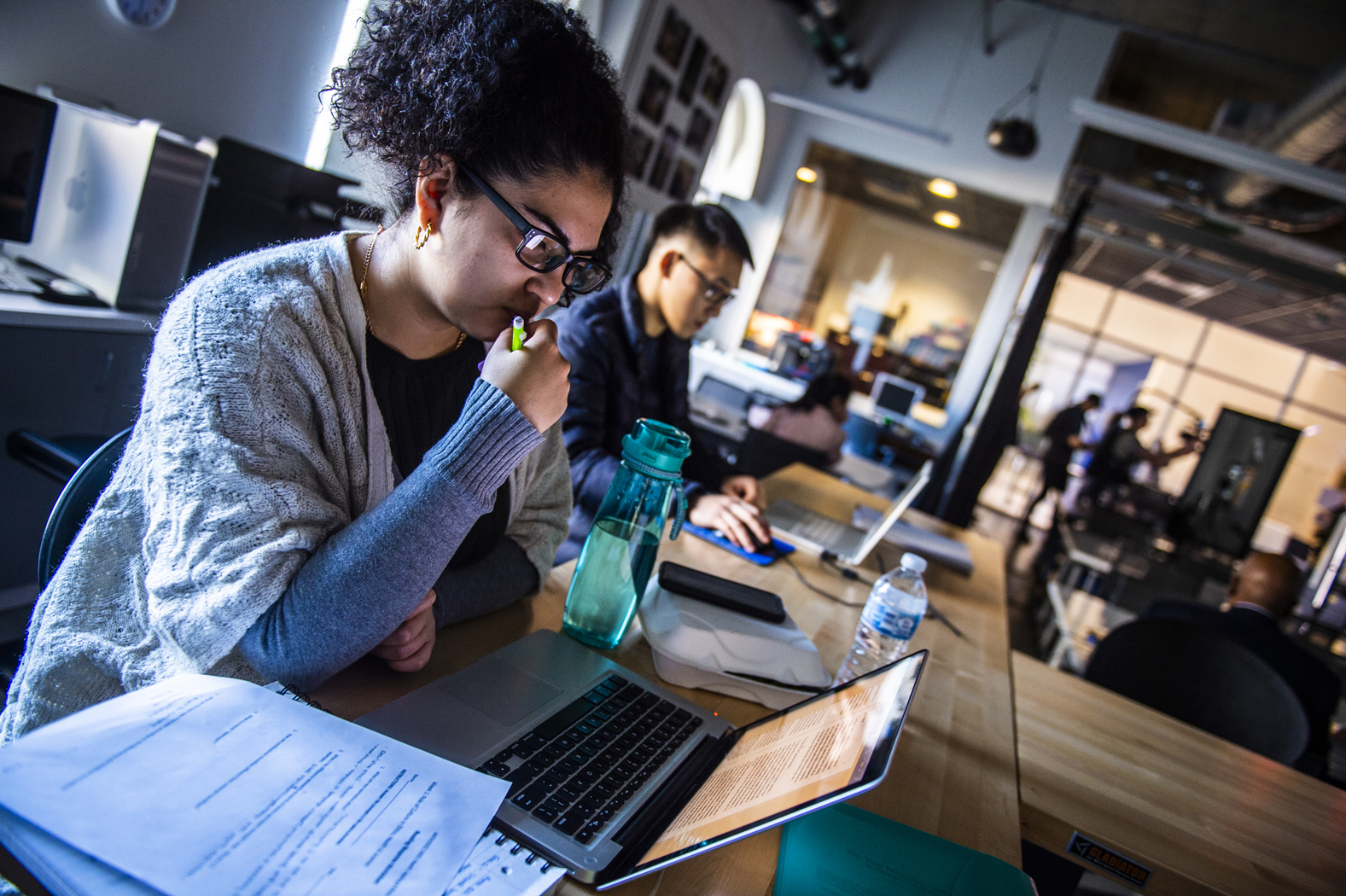 Image of student studying in library on computer