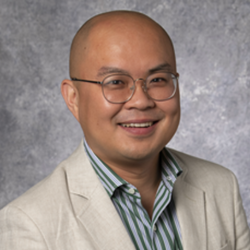 Headshot of Leo Yu, faculty member at SMU Dedman School of Law.