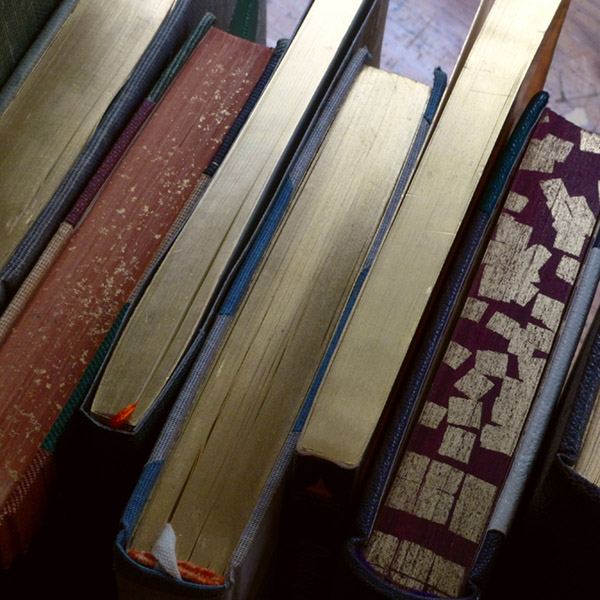 top view of books with gilded pages