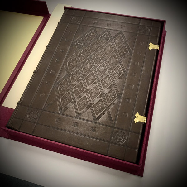 leather book with two clasps