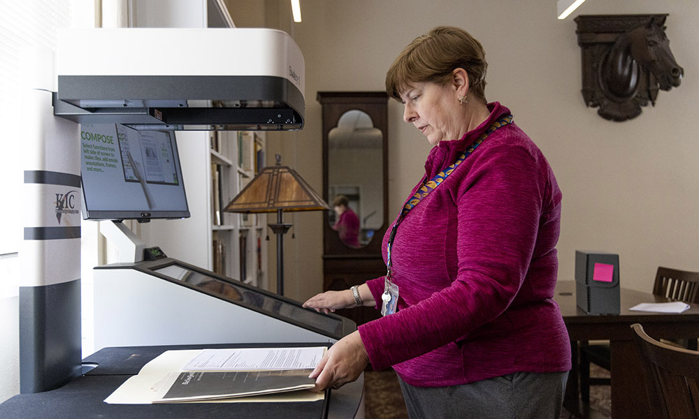 overhead book scanner in use