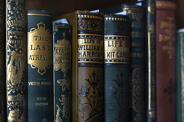 shelf of rare books in DeGolyer Library