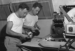  Albert Levin and Frank Davis working with photo prints (Saipan)