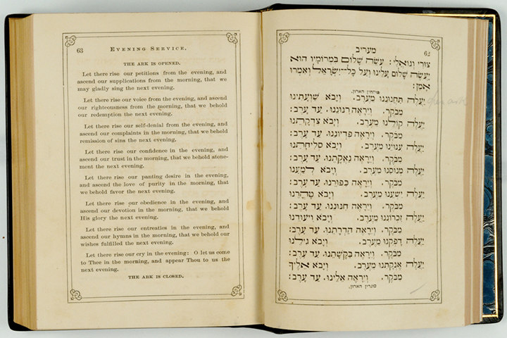 Jewish religious book open to the Evening Service. The left page is in English and the right page is in Hebrew. 