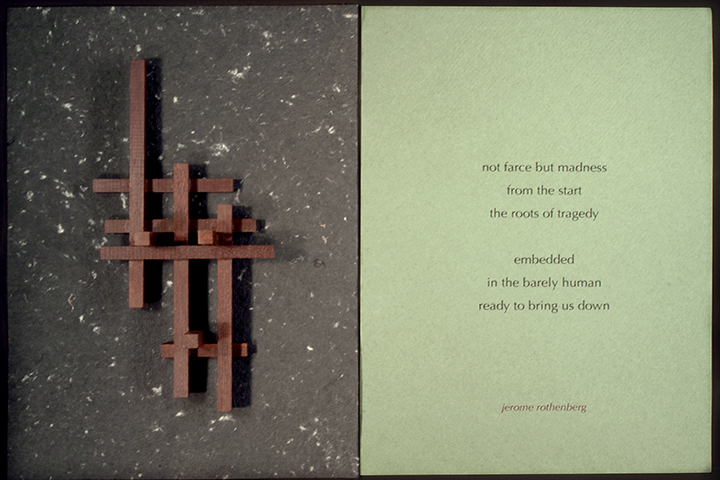 Wooden sculpture made of overlapping crosses on grey paper. On the left, green paper with text "not farce but madness from the start the roots of tragedy embedded in the barely human ready to bring us down jerome rothenberg".