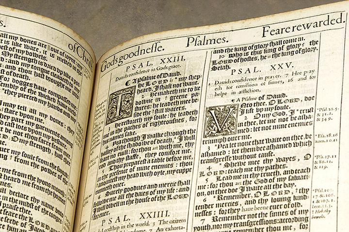 Snippet of King James Bible from 1611 displaying Psalm 23 with decorated initials at the beginning of the psalms.