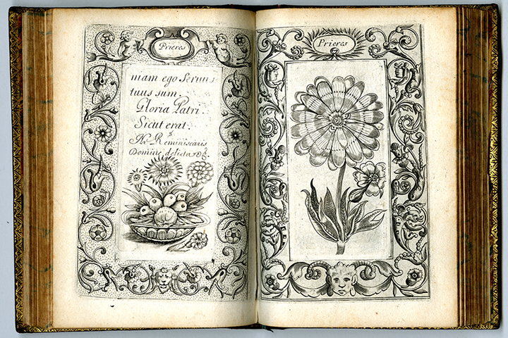 Open book with a prayer in French with ornamental borders and floral decorations engraved by Pierre Moreau.