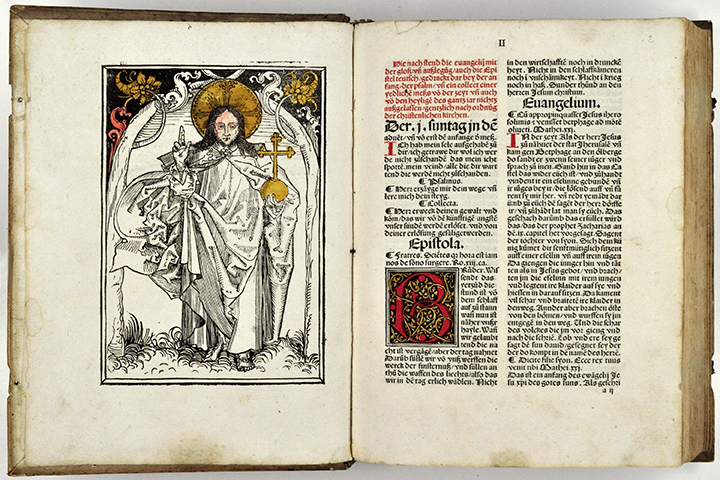 An open book of a German vernacular translation of Epistles and Gospels designated for church days with a woodcut of Jesus.