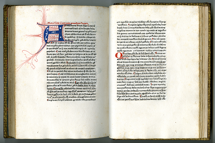 An open Greek book printed by Johann Fust and Peter Schoeffer with decorated and handwritten initials.