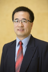 A headshot of Xin-Lin Gao, a member of the Lyle School of Engineering Faculty.