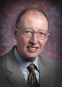 A headshot of Ron Rohrer, a member of the Lyle School of Engineering Faculty.