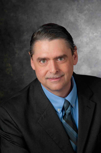 A headshot of Mitch Thornton, a member of the Lyle School of Engineering Faculty.