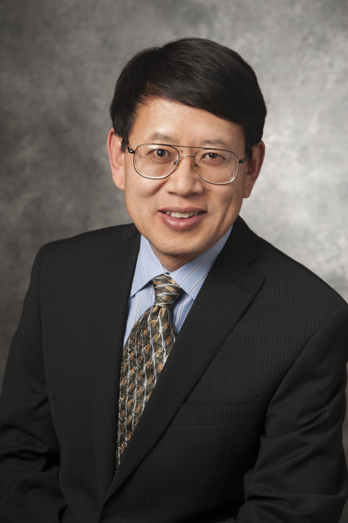 A headshot of Jeff Tian, a member of the Lyle School of Engineering Faculty.