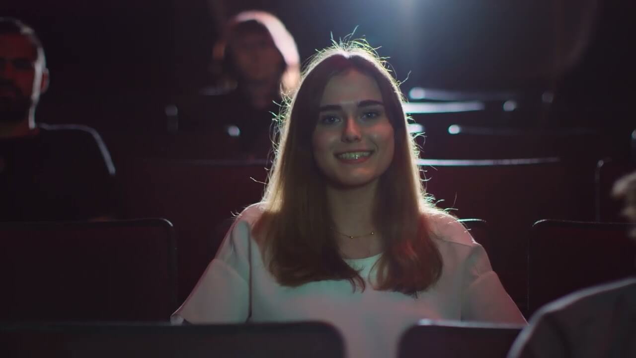 Woman in a movie theater