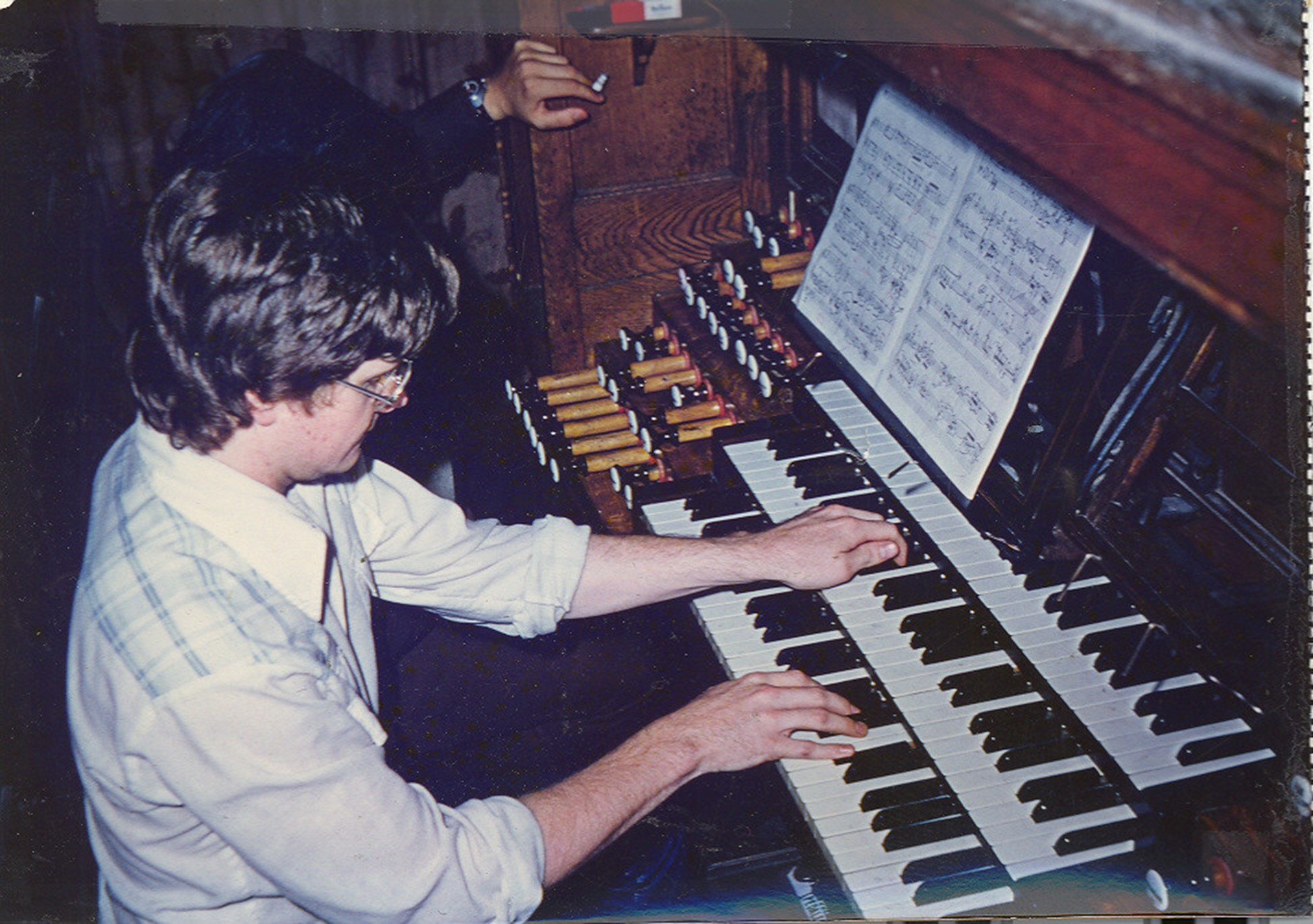 George Baker playing the organ in 1975